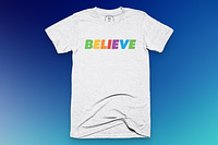 A white shirt with "Believe" written across it with the classic Apple six colors.