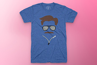 A blue shirt with an abstract version of Ted Lasso's face across the front.