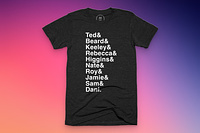 A black shirt with the names of the main characters from Ted Lasso listed down the shirt in white.