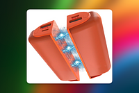 Two orange almost cylindrical hand warmers being pulled toward each other with magnets.